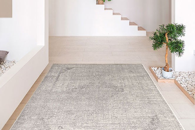 Het tapijt Mila grey is een vlakgeweven vintage tapijt wol en